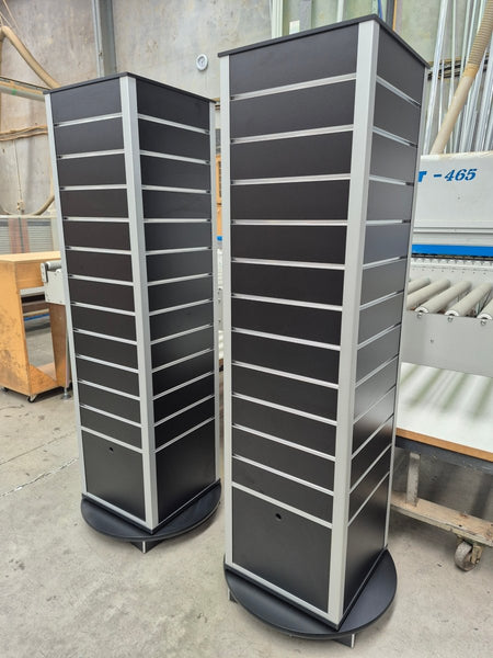Plankwall Black Display Tower Units x2 in a factory setting made with RA18 aluminium corner profiles