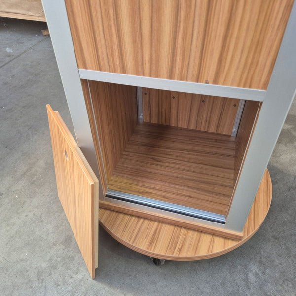 hidden storage shown here in Plankwall four sided display stand tower in bestwood laminate 