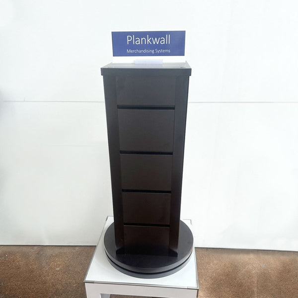close-up detail of countertop retail display stand with sign holder