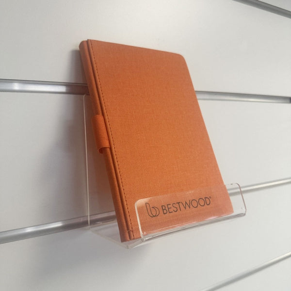 Plankwall book easel display holder wall mounted on a slatwall panel using Plankwal supergrip clip

