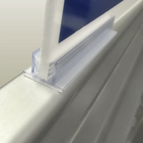  a close up of Plankwall adhesive friction sign holder hold signage in place 