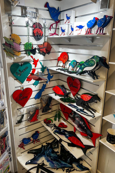 retail view of 9mm melamine shelving with pvc edge tape on a Plankwall display wall.