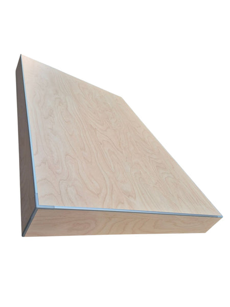 close-up of wood retail floor plinth with sitckman corners and edging