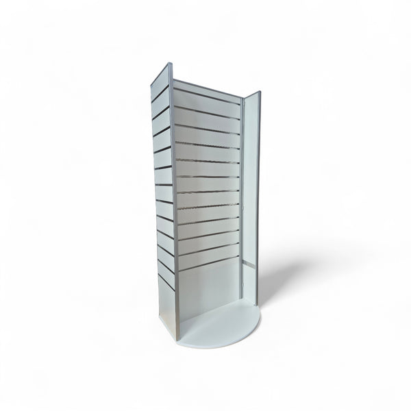 three quarter view of Plankwall's two sided rotating slatwall display stand 