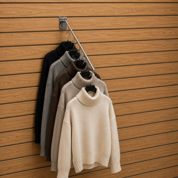 women's sweaters are hanging up on 5 hook bracket arm  on slatwall