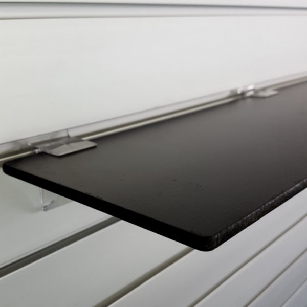 Front view of Plankwall 6 mm black melamine shelf with painted edges for modern shopfitting and display wall