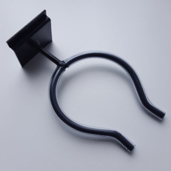 close-up detail of Plankwall's power tool display bracket with back plate for slatwall systems 