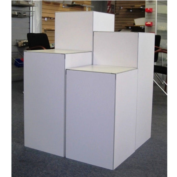 set of tall white Plankwall retail display cubes in the showroom