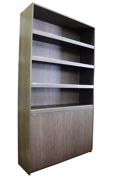 A cutout photo of a Plankwall Tall Display Cabinet in walnut wood finish with three  shelves and two drawers