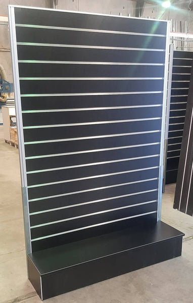 1x Plankwall Light free standing display panels in black on factory floor