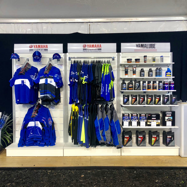 3x Plankwall free standing slatwall white display walls shown with merchandise at the Field Days exhibition Show  for use in exhibitions and merchandising  