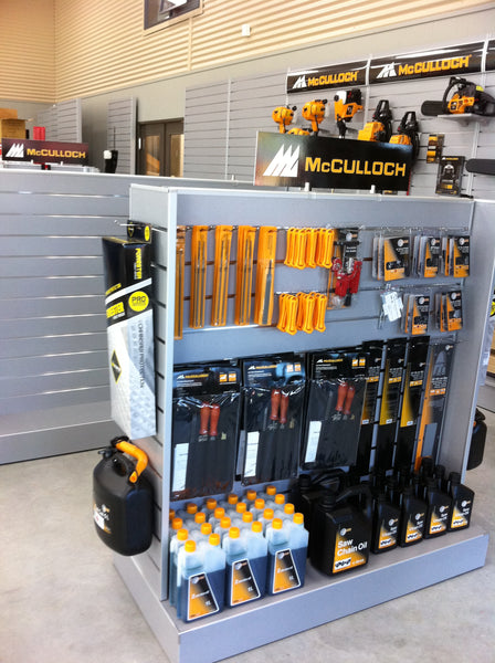 Grey Plankwall G60 gondola - 600mmW  with 300mm end panels with McCulloch signage and merchandise