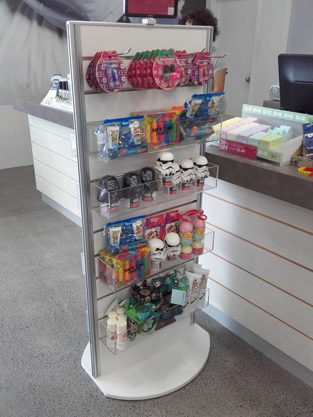 Plankwall Slatwall Retail display stand displaying kids toys products in retail giftshop