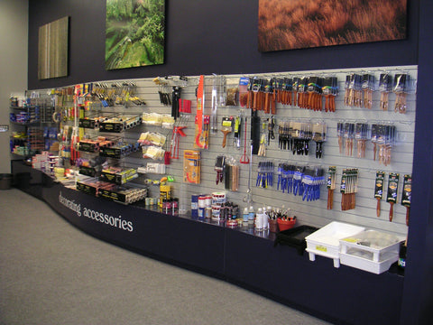 Plankwall slatwall retail display of paints and other painting supplies at Resene