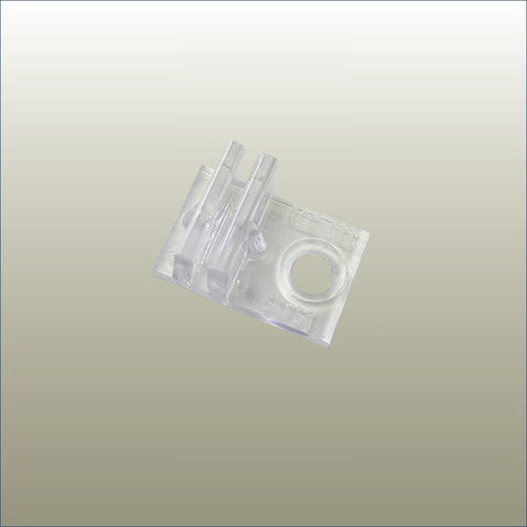 Single plastic bracket clip securing a slotted shelf bracket into a Plankwall slotted wall channel for retail display systems.