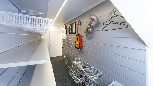 Custom slatwall linings in storage room