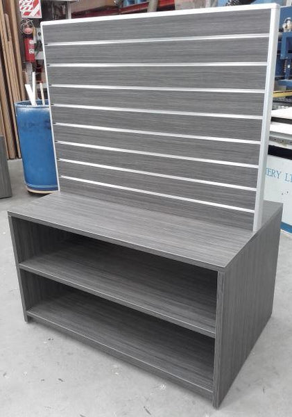Custom Retail Display stand in washed maple with wide slatwall display and open shelving