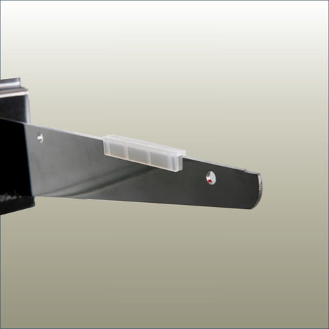 close up of a Friction pad accessory for stabilising shelves on slatwall brackets