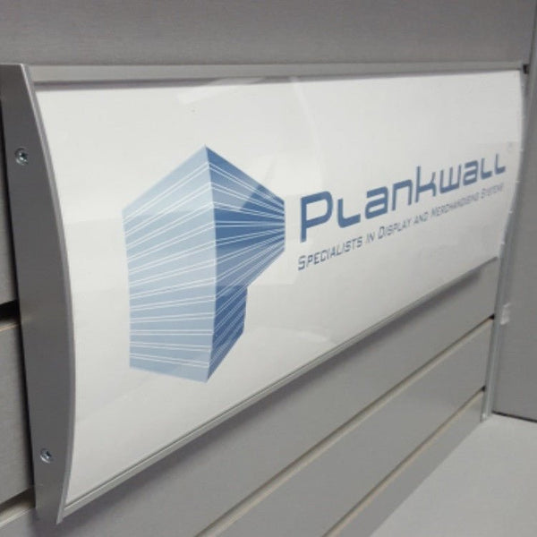 Close-up of Plankwall radius header frame showing clear acrylic insert for printed signage