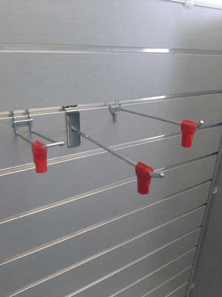 three examples of how to lock your merchandise with Plankwall security prong hook
