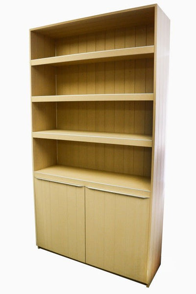 A cutout photo of a Plankwall Tall Display Cabinet painted yellow finish with three shelves and two drawers and V Groove backing panels
