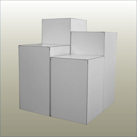 Plankwall® Tall Retail Display Cubes – Set of 4 stepped plinths in varied heights for modular retail floor merchandising, NZ-made melamine construction.