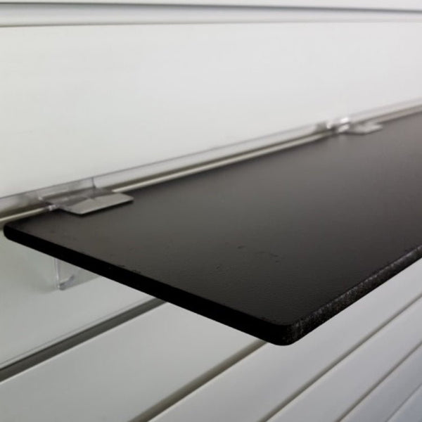 Front view of Plankwall 6 mm black melamine shelf with painted edges for modern shopfitting and display wall
