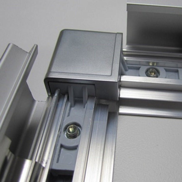 closeup view of a corner frame join component holding two ends together