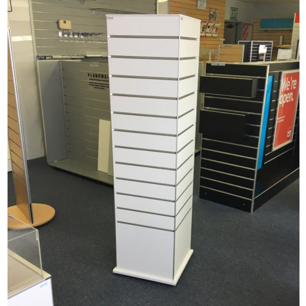 Plankwall white box tower display stand in white slatwall TOWX164ECON shown in the Plankwall showroom