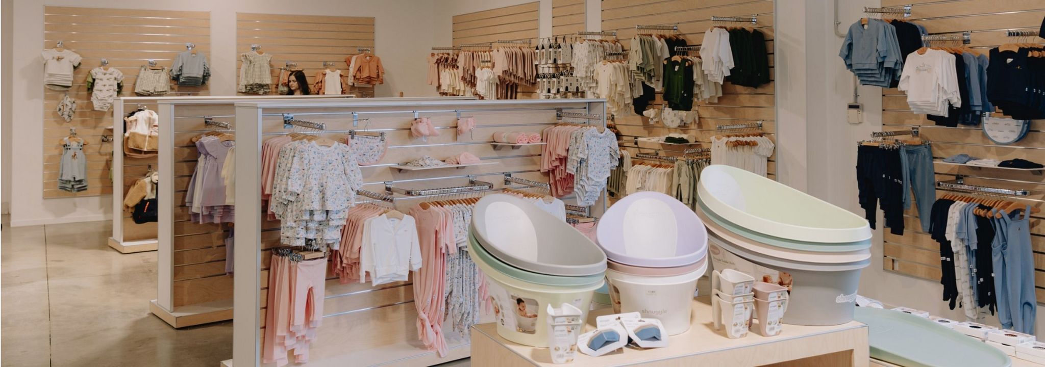 Plankwall Slatwall Display Units & Retail Merchandising Unit in a baby store in a premium ply finish